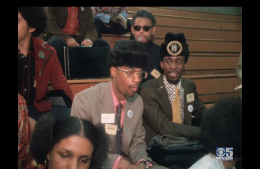 Image capture of Larry Pinkney and Robert Clark from footage of National Black Political Convention in 1972, Gary, Indiana